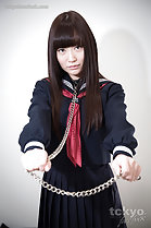 Kogal wearing bondage chain in uniform